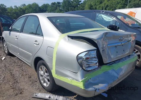 2002 Toyota Camry Le from USA, damaged, VIN 4T1BE32K42U504553